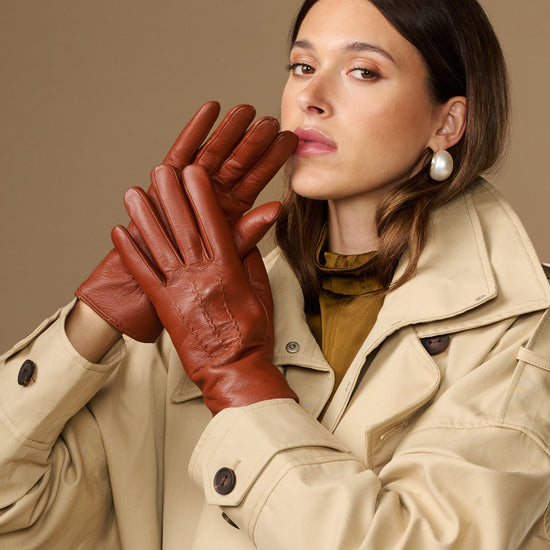 Cognac brown goatskin leather gloves with smooth finish and stitched finger lines