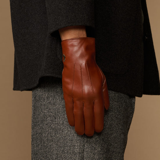 Men's leather glove with fur-lined cuff showing full hand silhouette