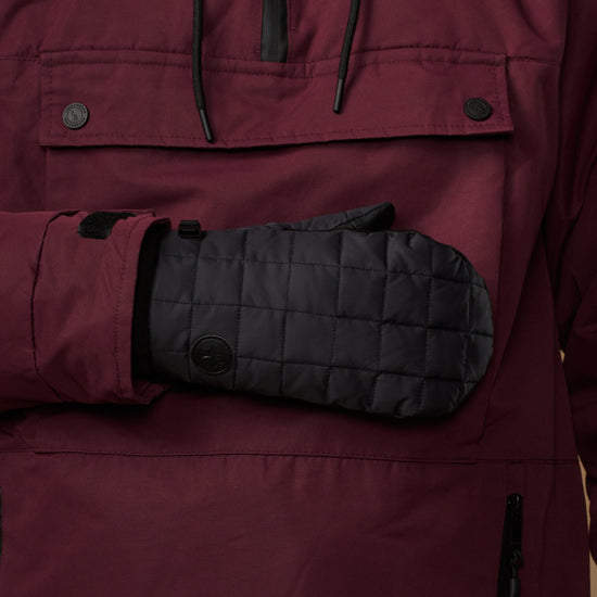 Black quilted mitten with a snap detail and long cuff.