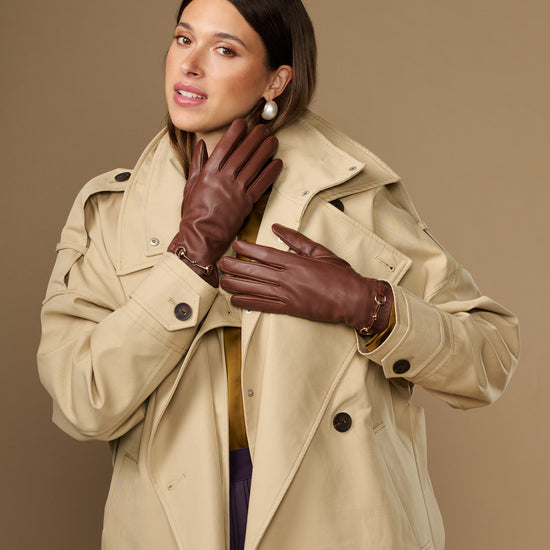 Dark brown lambskin gloves with gold-tone buckle detail and touchscreen fingertips