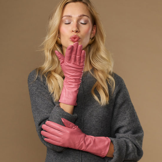Pink leather gloves with long cuffs and touchscreen fingertips, snug knit-like fit
