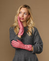 Pink leather gloves with long cuffs, curved thumb, touchscreen fingertips