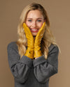 Yellow extra-long leather gloves with cashmere lining; cuff logo; touchscreen fingertips at wrists