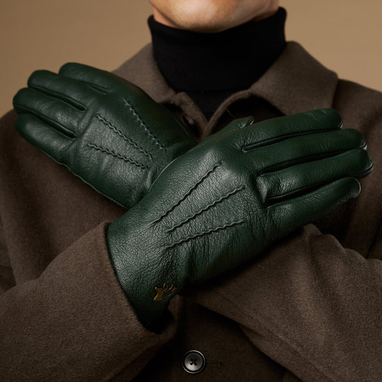 Men's dark green leather gloves with stitched details, wool-lined cuffs