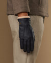 Men's navy leather gloves with wool lining, cuff showing soft inner knit