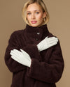 Women’s white leather gloves, crossed-hand styling, smooth lining and neat finger stitching