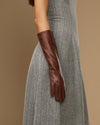 Women's brown below-elbow leather gloves, fitted cuffs with touchscreen detail